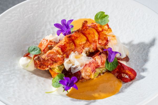 Grilled lobster with crab-stuffed cabbage